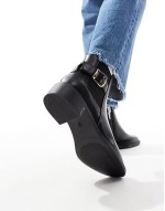 ankle boots with buckle details in black