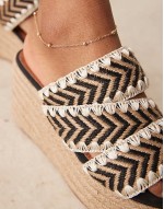 Thistle whipstitch detail wedge mules in natural and black