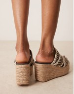 Thistle whipstitch detail wedge mules in natural and black