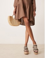 Thistle whipstitch detail wedge mules in natural and black